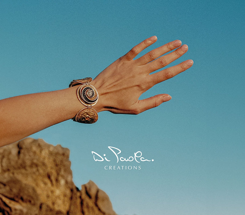 Hand wearing a Di Paola Creations recycled coffee pod bracelet