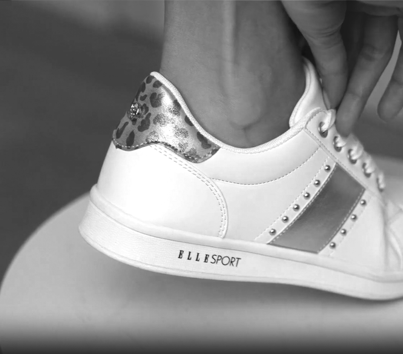 Black-and-white ELLE Footwear white tennis shoe